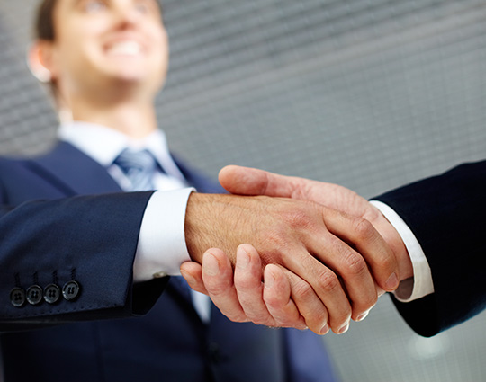 Shaking hands with business insurance and liability insurance in Marion, VA