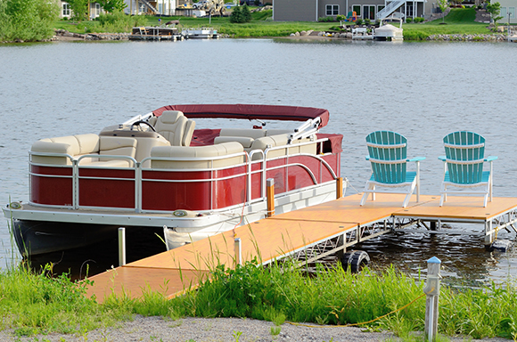 Boat and auto insurance in Chilhowie for watercraft on lake by small dock