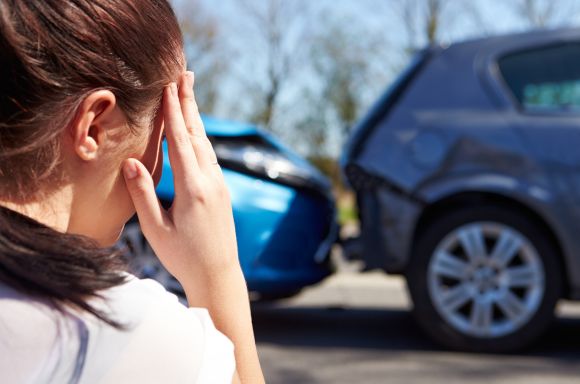 Woman with Hands on Head After Car Crash Needing Affordable Auto Insurance in Abingdon, VA 