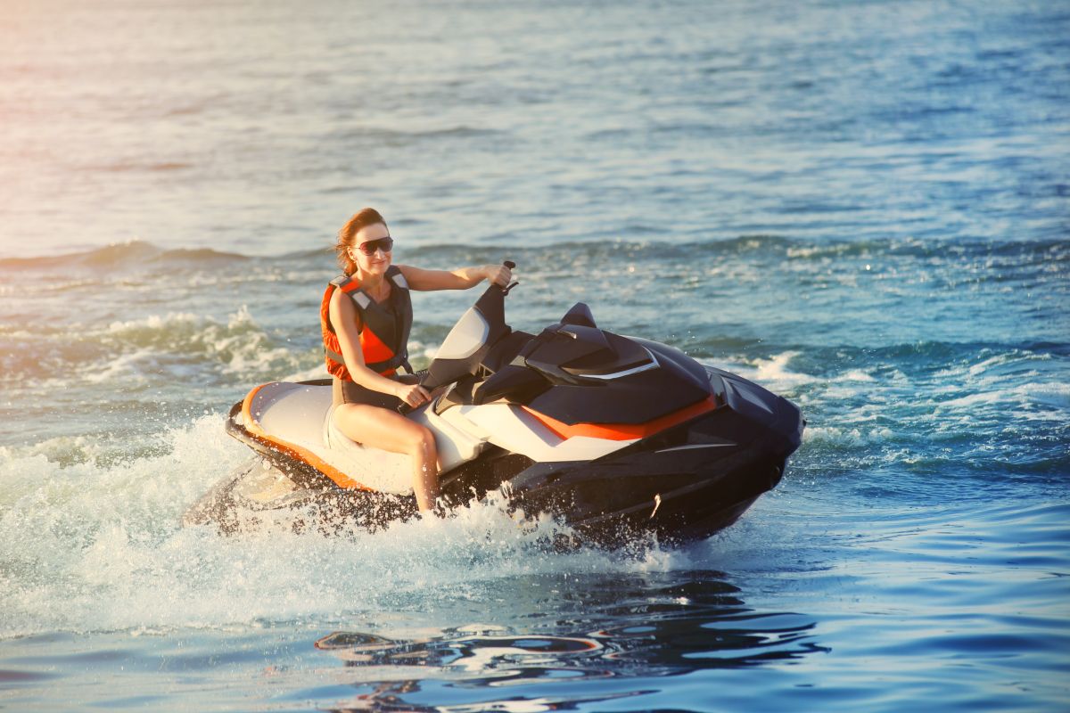 Young adult on a jet ski in water with Boat Insurance in Abingdon, VA, Bristol, VA, Wytheville, VA, Marion, VA, Glade Spring, VA, Chilhowie, VA